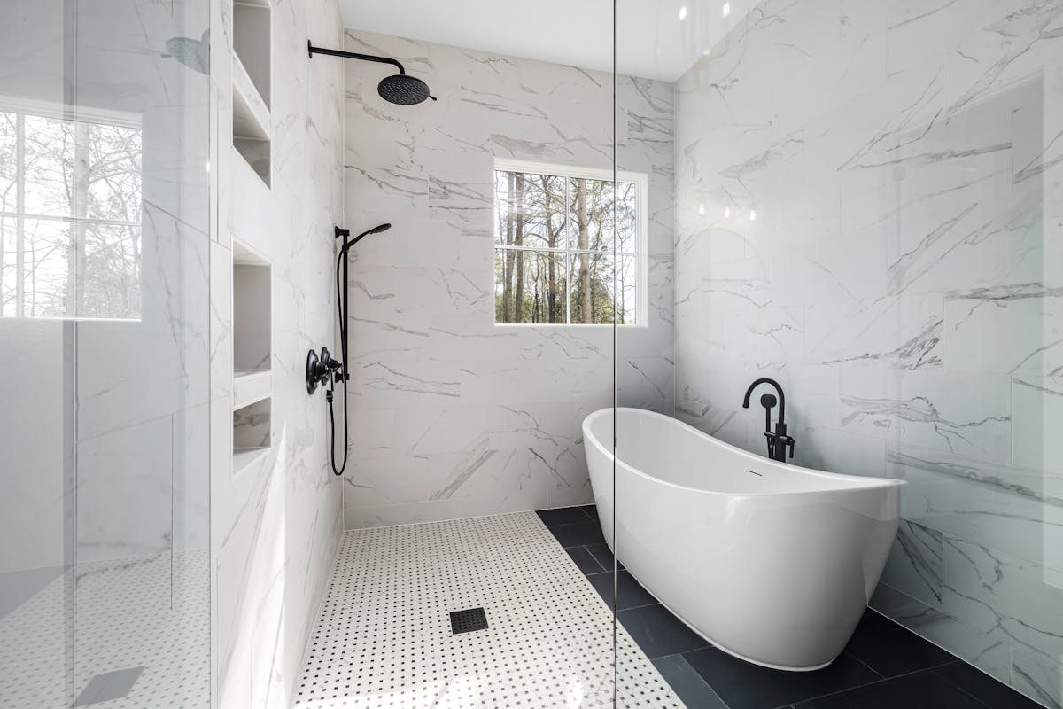 Luxury marble bathroom renovation with freestanding bath in Paddington